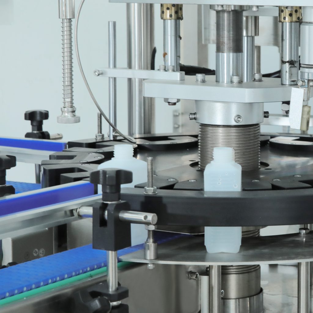 rotary bottle filling capping machine